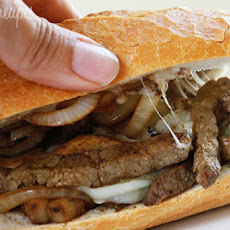 Steak and Cheese Sandwiches with Onions and Mushrooms