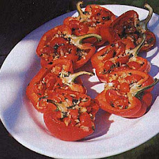 Roasted Peppers Stuffed with Cherry Tomatoes, Onion, and Basil