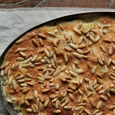 Airy Rosemary Citrus Pignole Bread Pudding