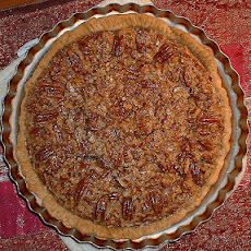 Pecan Crusted Ice Cream Pie with Caramel Sauce