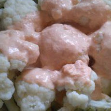 Steamed Cauliflower with Low-Fat Cheddar-Garlic Sauce