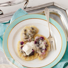 Pierogi with Blueberry Filling and Spiced Sour Cream