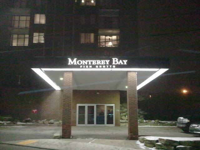Entrance to the building that houses the Monterey Bay Fish Grotto. It is on the top floor.