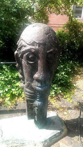 Gesicht eines Mannes Statue