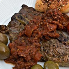 Grilled Pork Steaks with Lemon Butter Sauce