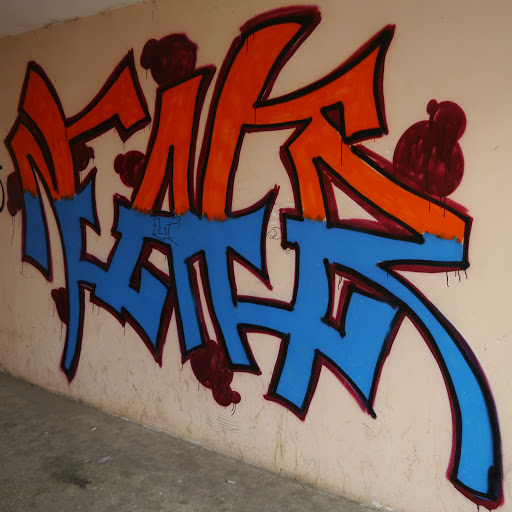 Red Blue Graffiti on Wall