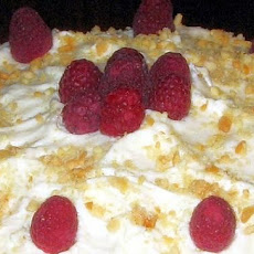 Raspberry Filled Cake With White Chocolate and Macadamias