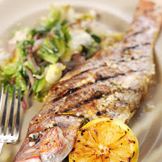 Grilled Whole Snapper with Escarole and Preserved Lemons