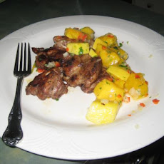 Jerk Chicken Thighs With Mango Salsa