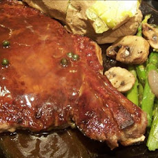 New York Steaks in Green Peppercorn Sauce
