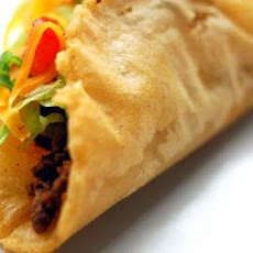 Puffy tacos stuffed with ground beef