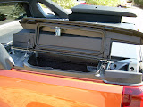 The nice storage pockets on both sides of the bed.