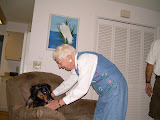 Grandma Hussey getting Winkie down from the chair.
