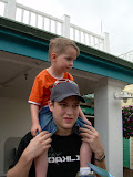 Chase holding Jay on his shoulders.