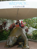 Chantel and Jay riding a stone bear.
