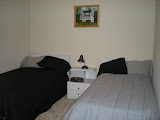 The other spare bedroom with the spare beds.