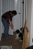 Katie giving the dogs treats.