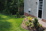Looking down the bed on the other side of the house.