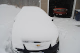 Katie's car, it lost it's garage spot so we didn't have to de-snow the 4-wheel drive truck.