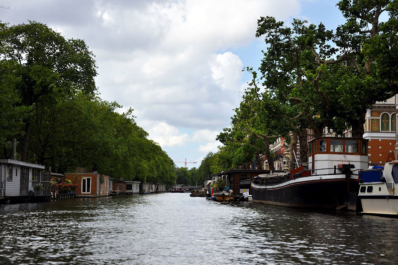 Плавучие домики на каналах Амстердама