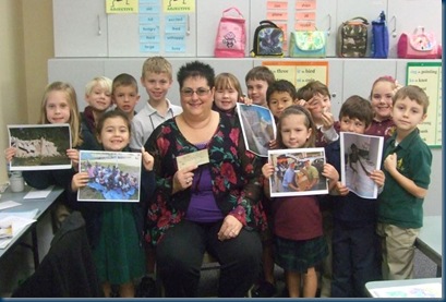 SFCA 1st graders giving RMI check for earthquake relief 2-4-10 tuned