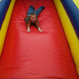 Bernie riding the slide headfirst