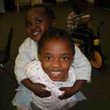 Florette giving Olenela a piggyback ride