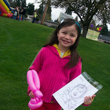 Grace with her caricature and balloon art