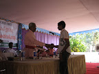 Bishop.Dr.C.V.Mathew distributing Dubai parish's endowment for the children who secured highest mark in different classes