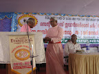 Bishop.Dr.C.V.Mathew accept the first copy from Bishop.Dr.T.C.Cherian.