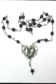 amethyst beads with silver heart and chain