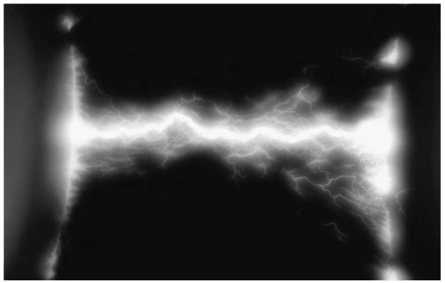 The electric discharge between two metal objects.