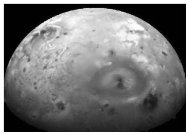 Galileo spacecraft image of Jupiter's moon Io. The giant active volcano Pele is prominent in this image. Much of Io's surface is covered by sulfur dioxide frost, and many of the colors may represent allotropes of sulfur. This figure is available in full color at http://www.mrw.interscience.wiley.com/esst.