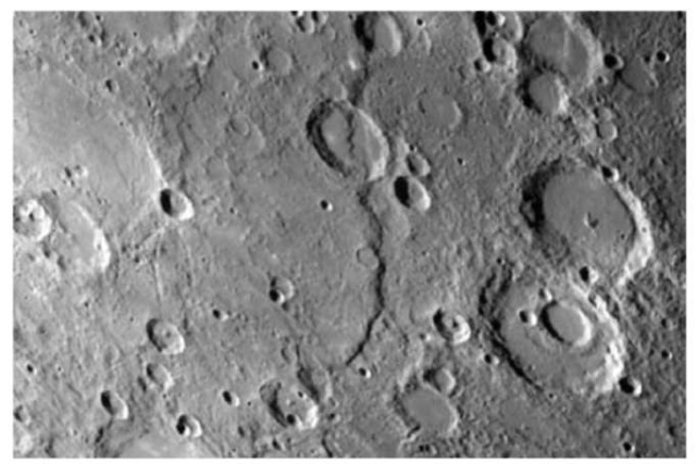 Discovery scarp is typical of the scarps on Mercury. The scarps are younger than many of the craters that are on Mercury's surface. Therefore, it is observed that they cut across them. These scarps it is believed, are thrust faults that were created by crustal shrinking of the planet as the core partially solidified.