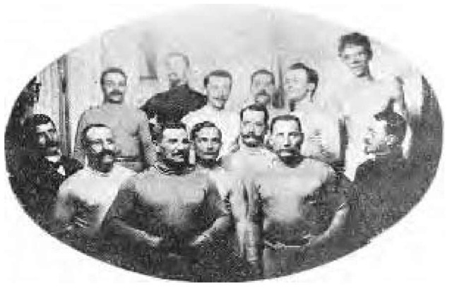 Two champions of savate (French boxing), J. Charlemont and V. Casteres (front row, third and fourth from left). 