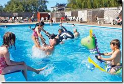 Enjoy a Relaxed Atmosphere Around the Outdoor Heated Swimming Pool