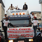  &ndash; Excitement in streets as truck with banner indicates possibility of more frequent and available electricity in Sierra Leone © 2007 Nazareth House Apostolate; all rights reserved