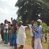  &ndash; Villagers along the highway to the up country wait to greet President Koroma as he passes by on his way through the provinces. . ..© 2008 Nazareth House Apostolate; all rights reserved