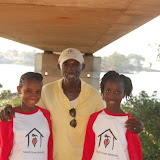  &ndash; James, Lucy &amp; Ann Marie go to the bridge to bring Rice to Mohamed's family that lives in the bridge. Earlier this day, James took Gladice to the hospital, paid some of her fees and she was admitted, Jan 17, 2008 . ......© 2008 NHA Photo.