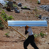  &ndash; Bringing in the sheets of zinc for the roof, Nazareth House School, Kabala. February 12, 2008....© 2008 NHA photos
