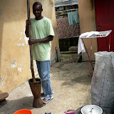  &ndash; Albert pounding cassava (James Mansaray, photographer)