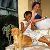  &ndash; St. Laurence House porch... Vicki Hicks, Lucy Mansaray and Simba (James B. Mansaray, photographer)