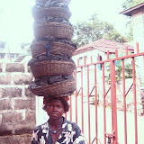  &ndash; Yeabu Kamara sells charcoal everyday to support her little brother and family. (©NHA photo James Mansaray 7 June 2007)