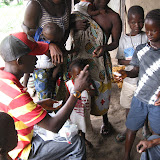  &ndash; James with people he meets along the way to Kabala. © NHA, J Mansaray 2007