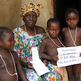  &ndash; Children with mama, all with rosaries. © NHA, J Mansaray 2007
