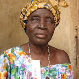  &ndash; Mama with pain rub given to her by James. © NHA, J Mansaray 2007