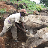  &ndash; Breaking up rocks from the land. . ... © 2007 NHA photos, J Mansaray