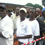  &ndash; James in his Nazareth House attire waits to vote: Election Day 11 August 2007, Freetown, Sierra Leone.... © 2007NHA photographs/JBM