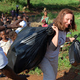  &ndash; Vicki carrying bag of flipflops and toys to give out to the students -- Sept 2007.......© 2007 NHA photos