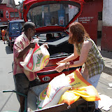  &ndash; loading car with rice.......© 2007 NHA photos